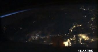 Screenshot of video showing a night view of Japan as seen from the International Space Station taken with the SS-HDTV camera