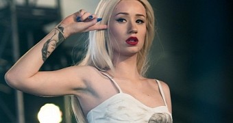 Iggy Azalea is mad paparazzi photos of her on vacation ended up online