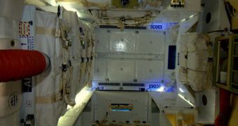 ESA flight engineer Andres Kuipers images the interior of the SpaceX Dragon capsule