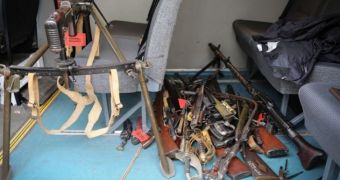 Hundreds of weapons were found in Martin Johnson's house