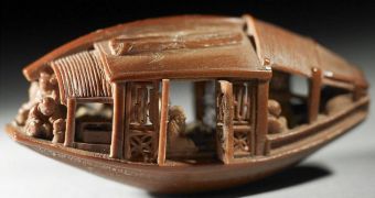 This amazing work of art was carved out of one olive pit by Chinese artist Ch’en Tsu-chang