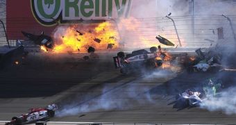 Dan Wheldon’s car bursts into flames as it’s hurled into the fencing at Indy 300 Las Vegas