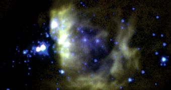 Image showing a cosmic cloud in the process of giving birth to a new, blue star