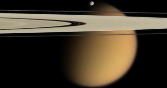 Image of Epimetheus, Saturn's rings and Titan in the background