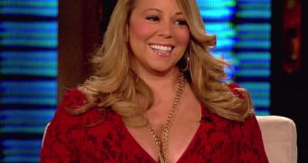 Mariah Carey and Nick Cannon are expecting a boy and a girl, she reveals for celebrity mag