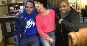 J.Lo poses for a shot with Chris Brown and Cory Rooney