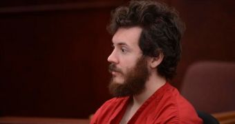 James Holmes sits in the courtroom, he has left his beard grow after his recent conversion to Islam