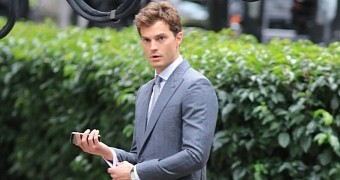 Jamie Dornan is dashing as Christian Grey on “Fifty Shades of Grey” movie set