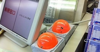 Spheres filled with orange paint are anti-crime devices in China