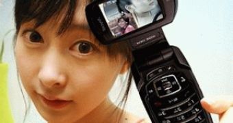 A Japanese girl with a multimedia cell phone