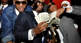 Rappers Nelly, Diddy and Jay Z make it rain