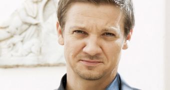 Jeremy Renner is considering doing the Julian Assange biopic with Bill Condon