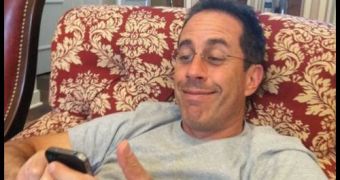 Photo of Jerry Seinfeld sending out his first tweet using an iPhone 4