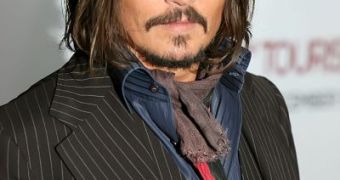 Johnny Depp says he doesn’t own a phone because they’re too intrusive