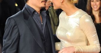 Johnny Depp doesn’t want a prenup to marry Amber Heard because he fears it will drive her away
