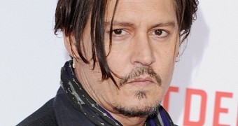 Johnny Depp has been sidelined from “Pirates 5” production by arm injury