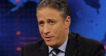 Jon Stewart Rips the NRA for Obama Ad