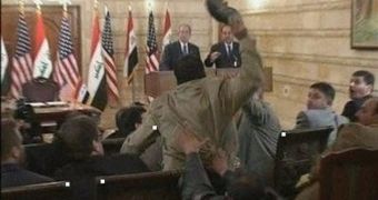 Journalist Muntazer al-Zaidi throws one of his shoes at president George W. Bush, during the former president's last visit to Iraq