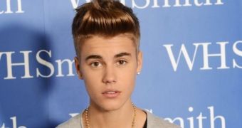 Justin Bieber can't handle his fame, attacks people taking photos of him