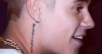 Justin Bieber adds one more tattoo to his collection as he prepares to surprise fans with "something big"
