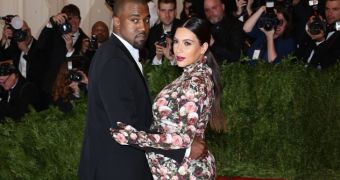 Kanye West and Kim Kardashian walk the red carpet at the MET Gala 2013 together