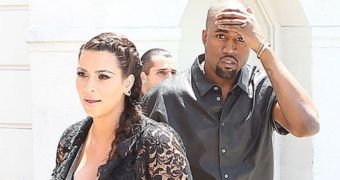 Kanye West walked into a street sign as he was trying to avoid the paparazzi