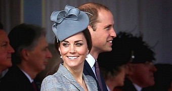 Kate Middleton shows off tiny baby bump in first public appearance since the pregnancy was announced