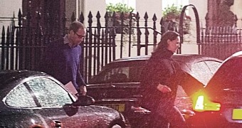 Kate Middleton is seen exiting the doctor's office together with William, who is clutching the ultrasound photos