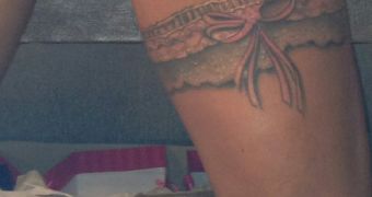 Katie Price Shows Off New Garter Tattoo on Her Thigh