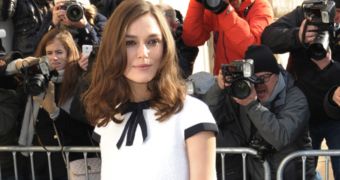 Keira Knightley wears Chanel dress at Chanel show in Paris