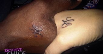 Khloe Kardashian shows off matching tattoos she and husband Lamar Odom got over the weekend
