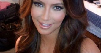 Kim Kardashian dyes her hair a lighter shade, chocolate brown