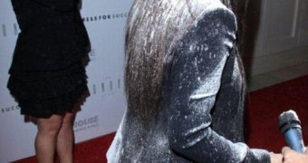 Kim Kardashian was flour-bombed on the red carpet by unknown Asian woman