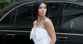Kim Kardashian attends her surprise bridal shower all dressed in white