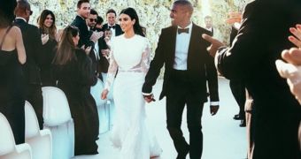Kim Kardashian and Kanye West as “Mrs. and Mr. Kanye West”