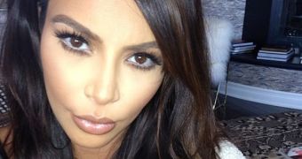 Kim Kardashian Lashes Out at the Paparazzi, Says They Threatened Her