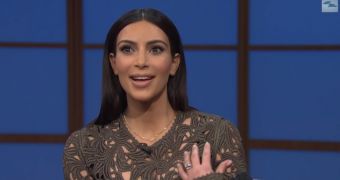 Kim Kardashian wears completely see-through dress to promote her Vogue photospread