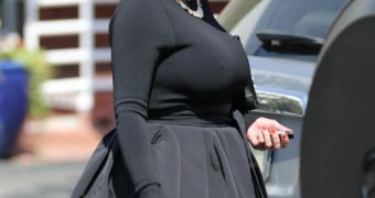 Kim Kardashian, now pregnant with her first child, goes furniture shopping