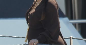 Kim Kardashian Shows Off Her Baby Bump on Magazine Cover