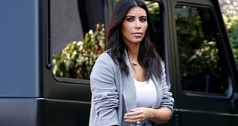 Kim Kardashian Steps Out with Birkin Bag Painted by Daughter North West – Photo