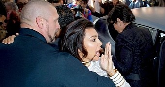 Kim Kardashian became the target of Vitalii Sediuk’s latest “prank,” almost got knocked down at Paris fashion show