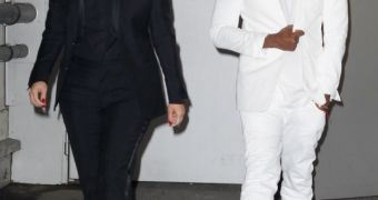 Kim Kardashian and Kanye West attend the Givenchy show at Paris Fashion Week