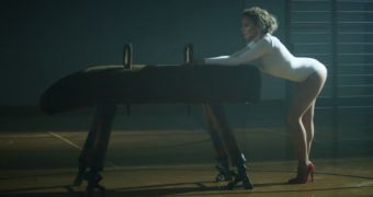 Kylie Minogue gets ready for a different kind of workout in new, highly controversial music video