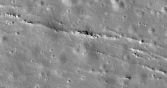 Fissures and associated pit-chains on Aitken crater floor, as seen by LRO's LROC NAC instruments. Image width is 580 meters (1,900 feet)
