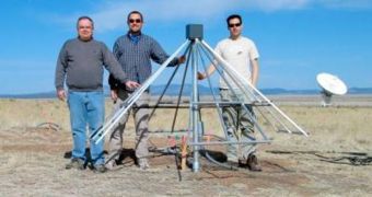 Standing next to a prototype of one of the anticipated 13,000 Long Wavelength Array dipole antennas are (left to right) Brian Hicks, Jake Hartman, and Paul Ray of the NRL