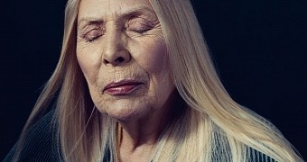 Singer Joni Mitchell, 71, has been rushed to the hospital after losing consciousness in her home