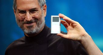 Steve Jobs unveiling one of the older iPod models