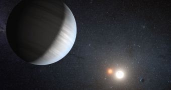 A rendition of the Kepler-47 binary systems, with the two stars in the background and the exoplanet Kepler-47c in the foreground (left)