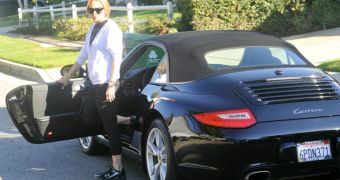 Lindsay Lohan totaled a rental Porsche by crashing it into an 18-wheeler