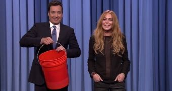 Lindsay Lohan prepares to be drenched in ice water for the ALS Ice Bucket Challenge